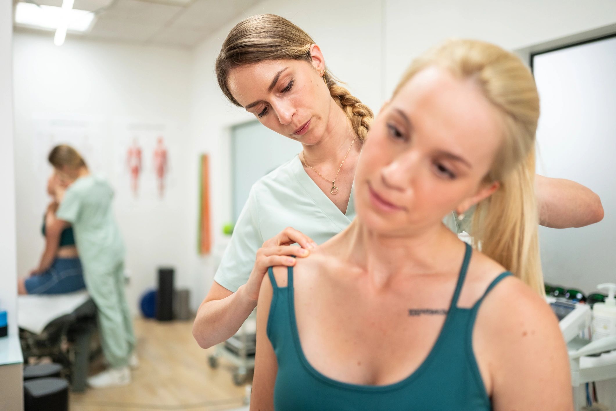 Wellness professional supporting a client during recovery care